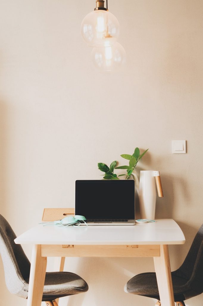 wall, light, bulb, work, desk, table, chairs, furniture, nature, computer, laptop, business, study, plant, headset
